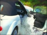 Raw Video: Hydrant Floods Roadster
