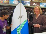 Meg Whitman Buys Surfboard in OB