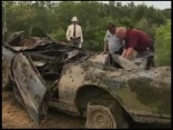 Drought Reveals Stolen Car Graveyard