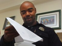 Flat-Screen TV at Center of Case Against Cop