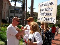 Tempers Flare at Downtown Tea Party Protest 