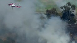 Firefighters Extinguish Canyon Fire