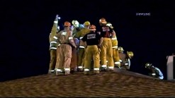 Firefighters Rescue Soot-Covered Man Stuck in Chimney