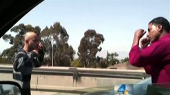 Two in Custody in LA Highway Fight