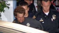 Standoff Suspect Coaxed Off Roof