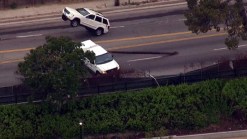 SUV Snags Downed Utility Line