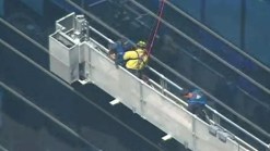 Firefighters Rescue Trapped Window Washers
