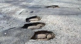 Daley Warms to Idea of Corporate Pothole Repair
