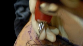 Man Steals "God" Tattoo 
