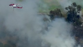 Firefighters Extinguish Canyon Fire