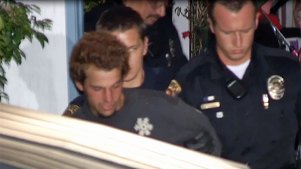 Standoff Suspect Coaxed Off Roof