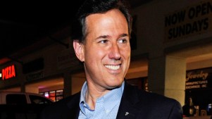 Santorum Ad Shows Romney with Machine Gun