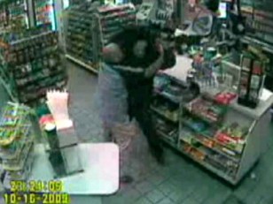 Cashier Fights off Rifle-Toting Robber