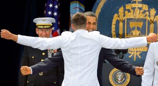 Obama Embraced at Annapolis Ceremony