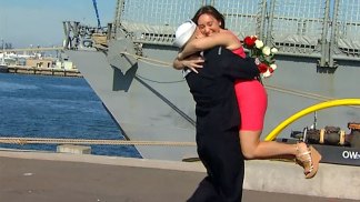 Kisses, Hugs as USS Curts Returns