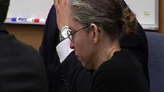 Woman Begins Trial as Murder Suspect