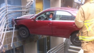 Driver Stuck After Crashing Into Building