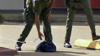 Suspect Leaves Behind Bags in Bank Holdup: Images