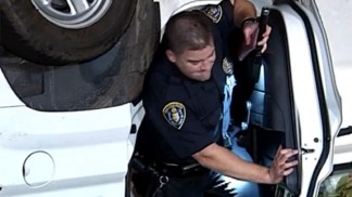 Hero Cop Makes Second Rescue