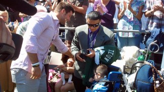 Tebow Surprises Baby Izaiah's Family