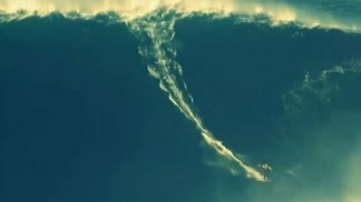 Surfer Conquers 90-Foot Wave