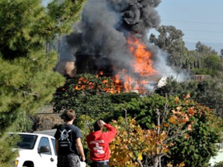 Images: House Packed With Explosives Torched