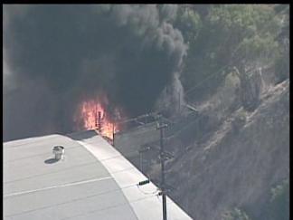 Black Smoke Pours From Industrial Fire