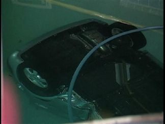 Car into Pool on Rollercoaster Road