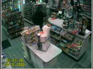 Clerk Fights off Rifle-Toting Robber