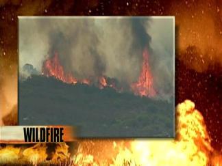 Firefighters Battle Wall of Flames