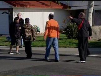 Neighbors Confront Men Painting Over Vandal's Threat