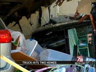 Pickup Plows into Homes in Coincidence Crash