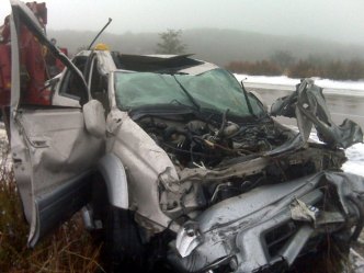Drivers Survive Car's 200' Plunge