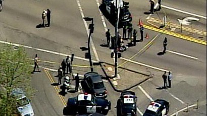A corpse, a bloody street and a law-enforcement investigation are left in the wake of gunfire in an East County intersection. A corpse, a bloody street and a law-enforcement investigation are left in the wake of gunfire in an East County intersection.