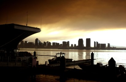 The nuclear-powered aircraft carrier USS John C. Stennis prepares leave port .