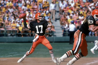 Quarterback Brian Sipe #17 of the Cleveland Browns throws a pass under the protection of offensive tackle Cody Risien #63 during a game against the San Diego Chargers at Jack Murphy on September 25, 1