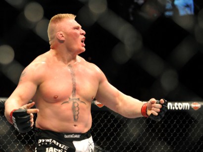 Brock Lesnar, shown here after winning his 2009 heavyweight title bout, is now facing a career-threatening intestinal illness in addition to a serious bacterial infection. Brock Lesnar, shown here after winning his 2009 heavyweight title bout, is now facing a career-threatening intestinal illness in addition to a serious bacterial infection.