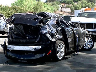 The Mazda was totaled in the crash. The Mazda was totaled in the crash.