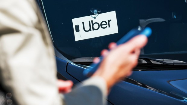 Uber says growth strong as it gives a peek at earnings