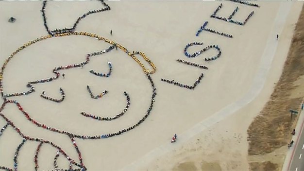 1,000 Kids Form Beach Art