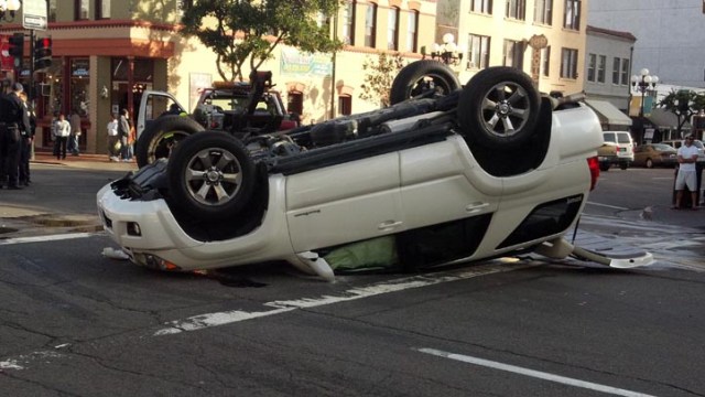 SUV Flips Over Downtown