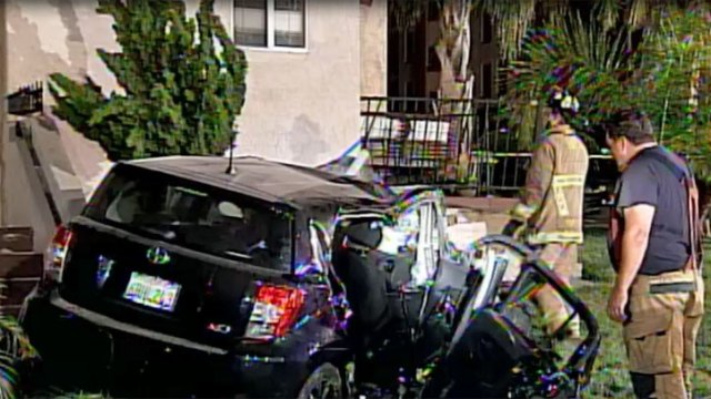 Car Crashes Into Bankers Hill Home: Images