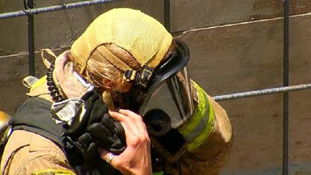 Fire Sparks Under Condo Construction Site: Images