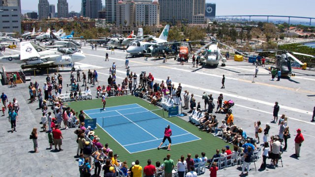 Midway Museum Hosts Tennis Match: Images