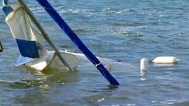 Photo Op Capsizes Sailboat