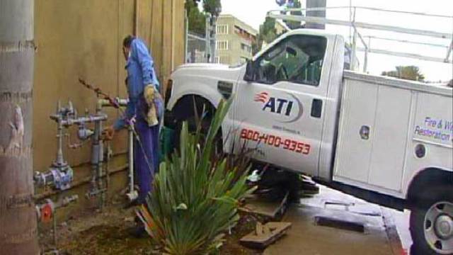 Truck Slams into Hair Salon: Images