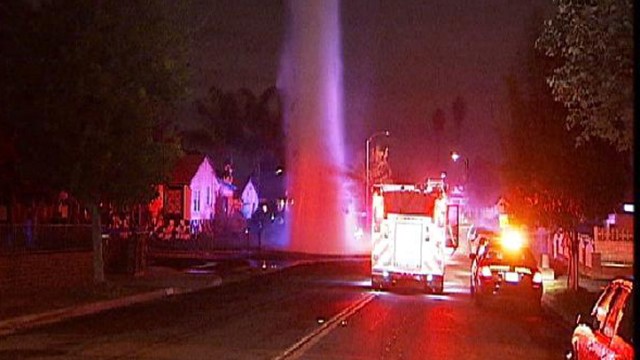 25-Foot Geyser Floods Street After Accident