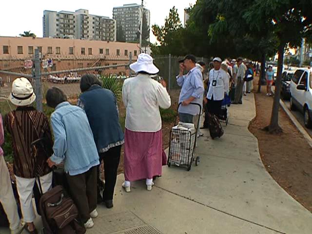 San Diegans Wait in Bread Lines