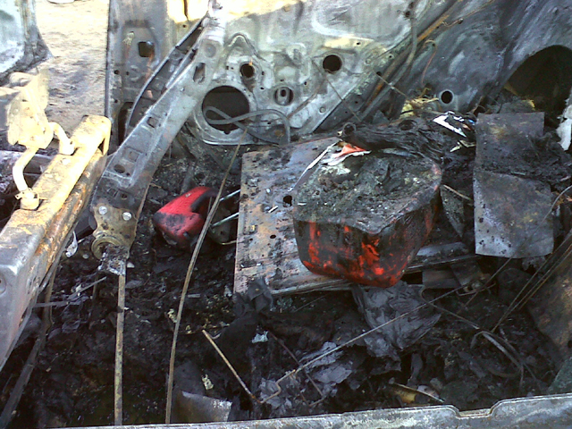 Images: Burned Body Found in Car