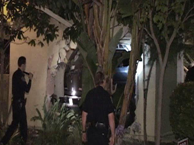 SUV Slams into Apartment Complex